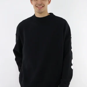 Sudadera oversize de color negro con estampado