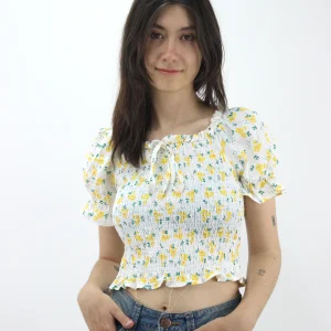 Blusa corta con estampado floral de manga farol con nudo delantero
