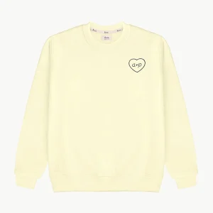 SUDADERA UNISEX LIGHT YELLOW | PERSONALIZADA CORAZÓN